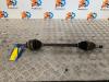 Nissan Pixo (D31S) 1.0 12V Aandrijfas links-voor