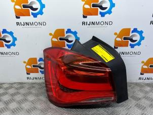 Gebruikte Achterlicht links BMW 1 serie (F20) 118i 1.5 TwinPower 12V Prijs € 205,70 Inclusief btw aangeboden door Autodemontage Rijnmond BV