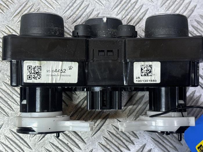 Kachel Bedieningspaneel van een Chevrolet Aveo (300) 1.3 D 16V 2012