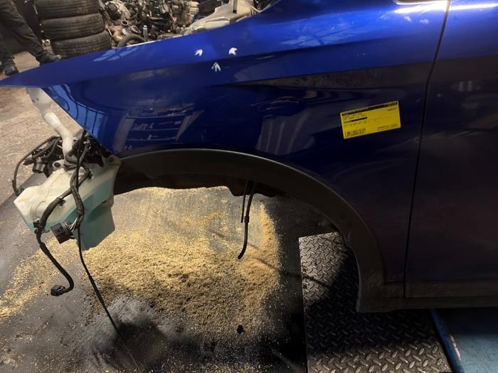 Spatbord links-voor van een Seat Arona (KJX) 1.0 TSI 12V 2021