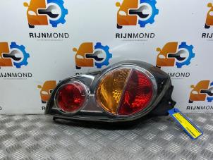 Gebruikte Achterlicht links Chevrolet Spark (M300) 1.0 16V Bifuel Prijs € 39,99 Margeregeling aangeboden door Autodemontage Rijnmond BV