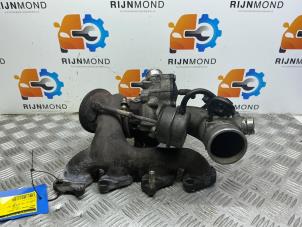 Turbo van een Opel Astra J (PC6/PD6/PE6/PF6) 1.4 Turbo 16V 2012
