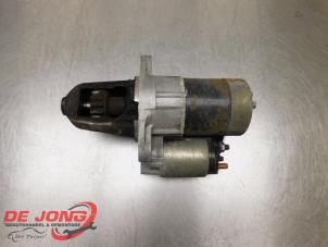Startmotor van een Nissan X-Trail (T30) 2.0 16V 4x2 2005
