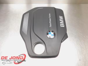 Gebruikte Afdekplaat motor BMW 1 serie (F20) 118d 2.0 16V Prijs € 21,99 Margeregeling aangeboden door Autodemontagebedrijf de Jong