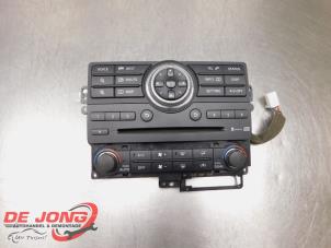 Gebruikte Radiobedienings paneel Nissan Navara (D40) 3.0 dCi V6 24V DPF 4x4 Prijs € 200,00 Margeregeling aangeboden door Autodemontagebedrijf de Jong
