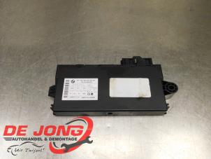 Gebruikte Comfort Module BMW X5 (E70) xDrive 35d 3.0 24V Prijs € 59,90 Margeregeling aangeboden door Autodemontagebedrijf de Jong