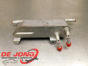 Gebruikte Oliekoeler Ford Focus 4 1.0 Ti-VCT EcoBoost 12V 125 Prijs € 70,00 Margeregeling aangeboden door Autodemontagebedrijf de Jong