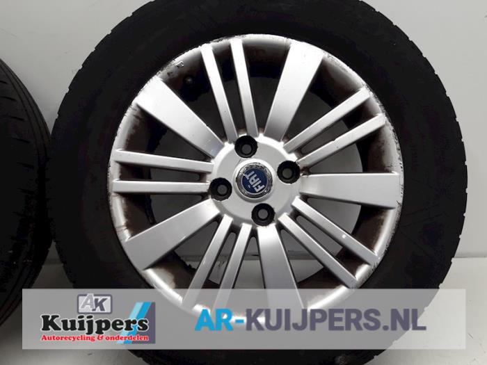 Velgen set + banden - Fiat Punto Grande