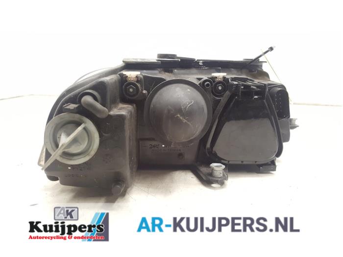 Koplamp links - Volkswagen Passat
