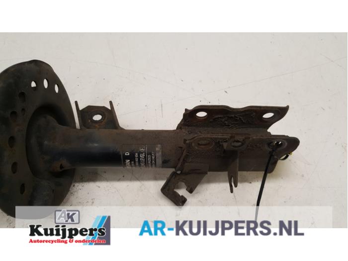 Schokdemper links-voor - Nissan Qashqai