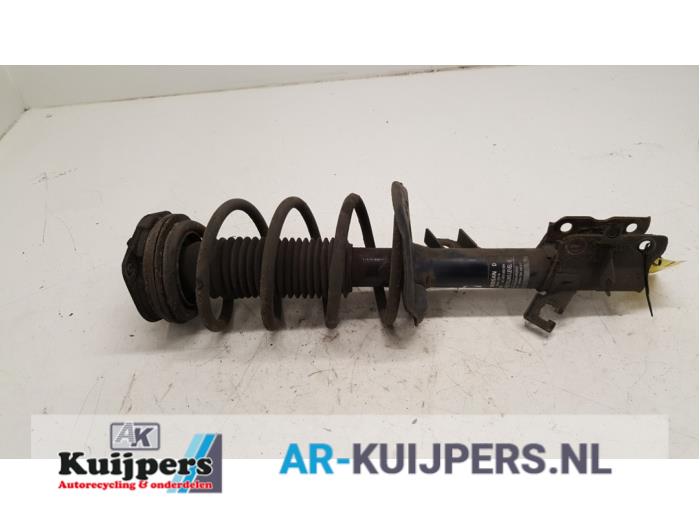 Schokdemper links-voor - Nissan Qashqai