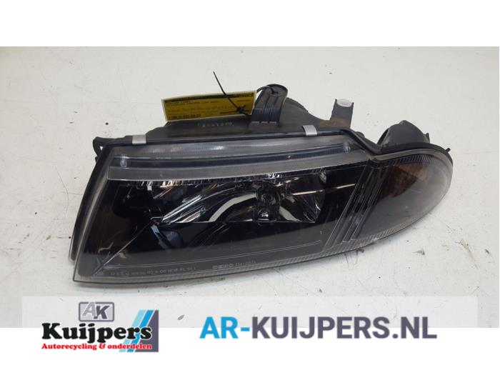 Koplamp links - Mitsubishi Carisma