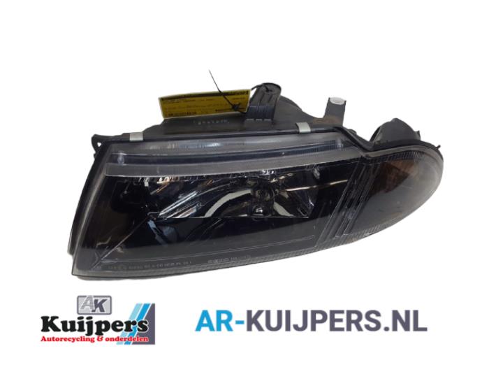 Koplamp links - Mitsubishi Carisma