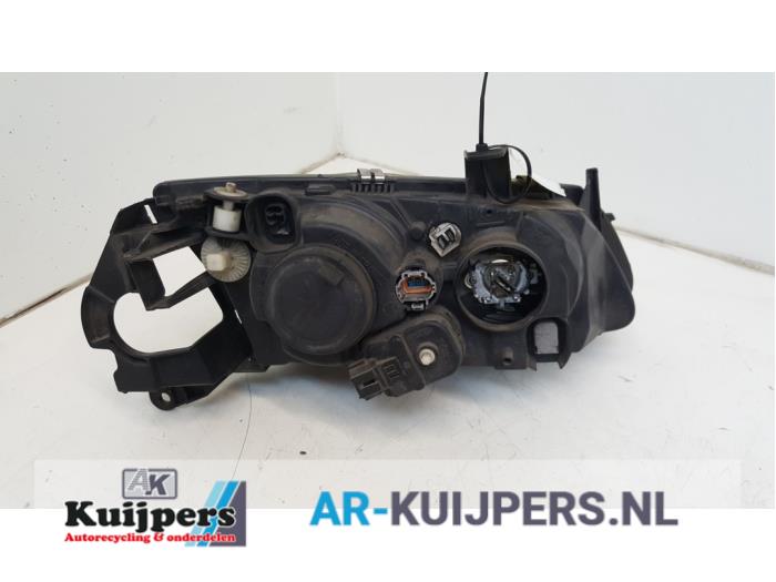Koplamp links - Nissan Almera