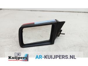 Gebruikte Spiegel Buiten links Opel Kadett E (33/34/43/44) Prijs € 10,00 Margeregeling aangeboden door Autorecycling Kuijpers
