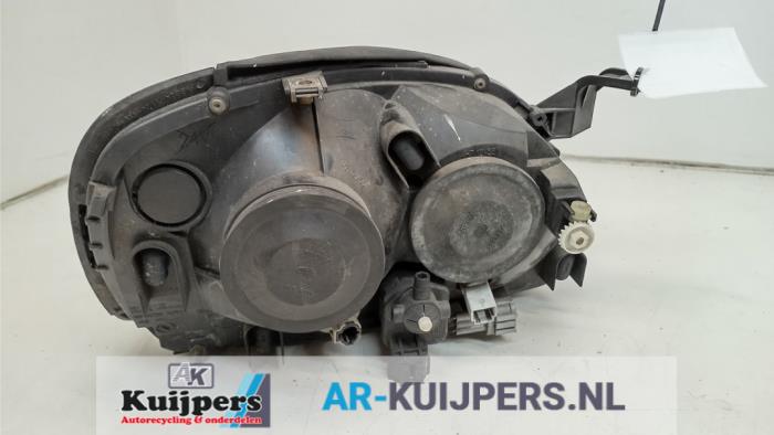 Koplamp links - Nissan Almera Tino