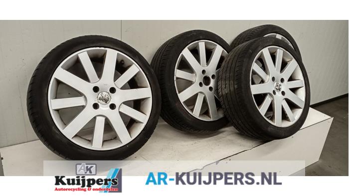 Velgen set + banden - Peugeot 207