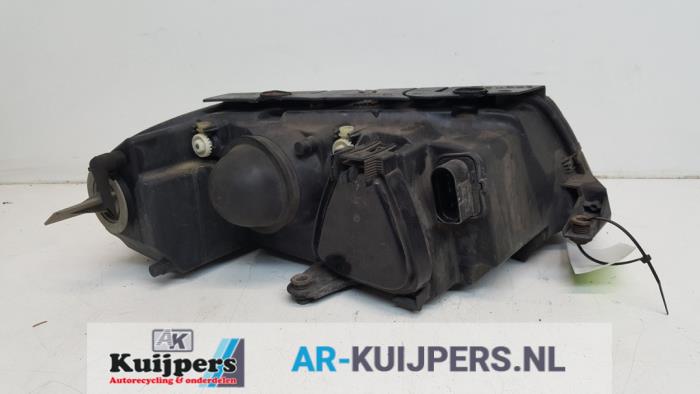 Koplamp links - Volkswagen Passat