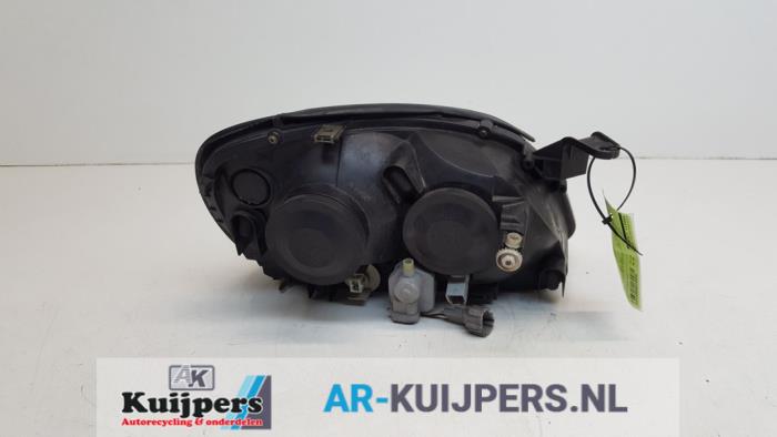 Koplamp links - Nissan Almera Tino
