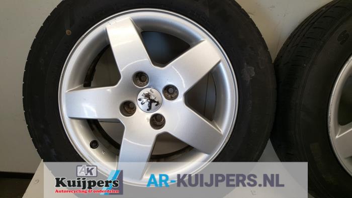 Velgen set + banden - Peugeot 207