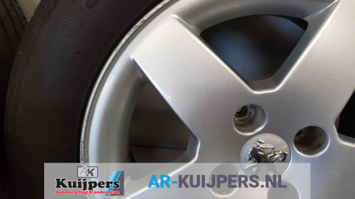 Velgen set + banden - Peugeot 207