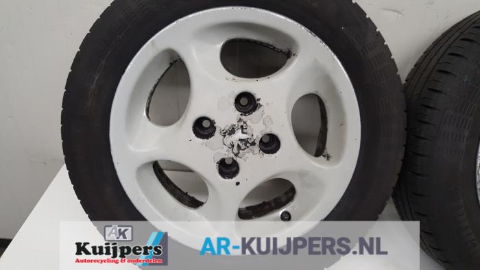 Velgen set + banden - Peugeot 106
