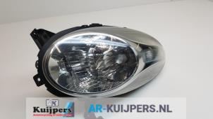 Gebruikte Linker Koplamp Nissan Micra (K12) 1.2 16V Prijs € 70,00 Margeregeling aangeboden door Autorecycling Kuijpers