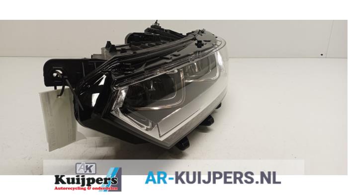 Koplamp links - Volkswagen Passat