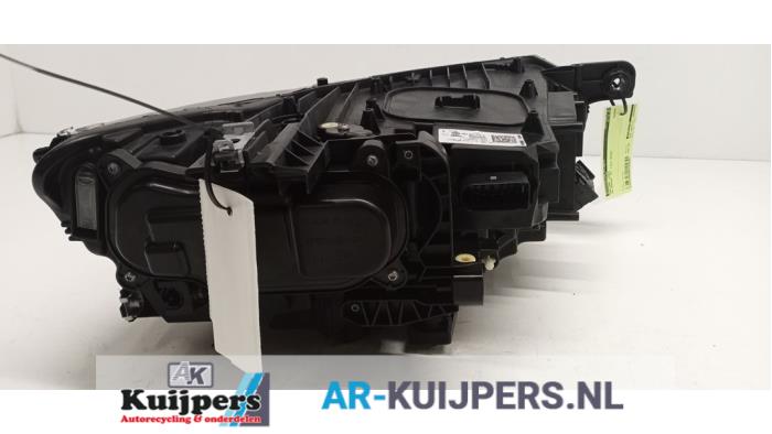 Koplamp links - Volkswagen Passat