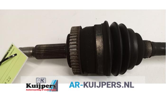 Aandrijfas links-voor - Kia Sportage
