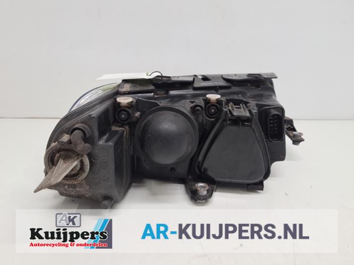 Koplamp links - Volkswagen Passat