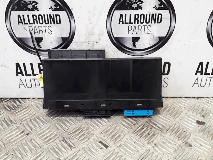 Computer Body Control van een BMW X1 (E84) sDrive 18d 2.0 16V 2010