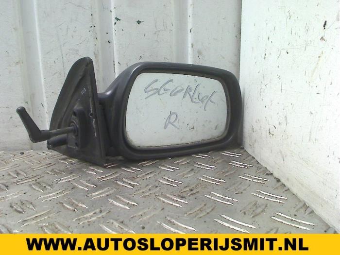 Spiegel Buiten rechts van een Toyota Starlet (EP8/NP8) 1.3 Friend,XLi 12V 1991