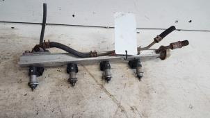 Gebruikte Injector brug Honda Logo (GA33) 1.3 Prijs op aanvraag aangeboden door Autodemontagebedrijf Smit