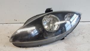 Gebruikte Koplamp links Seat Leon (1P1) 2.0 FSI 16V Prijs € 55,00 Margeregeling aangeboden door Autodemontagebedrijf Smit