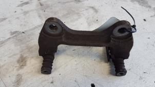 Gebruikte Remzadel links-voor Daihatsu Sirion 2 (M3) 1.3 16V DVVT Prijs € 15,00 Margeregeling aangeboden door Autodemontagebedrijf Smit