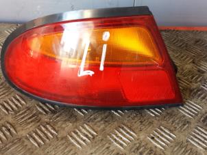Gebruikte Achterlicht links Mazda 323 F (BA14) 1.5i GLX,GT 16V Prijs € 25,00 Margeregeling aangeboden door Autodemontagebedrijf Smit