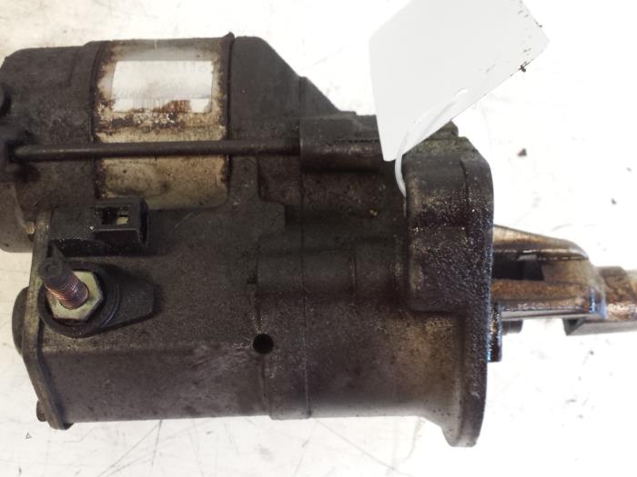 Startmotor van een Chrysler Voyager/Grand Voyager (RG/RS) 3.3 V6 AWD Grand Voyager 2004