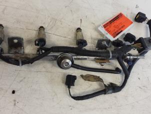 Gebruikte Injector brug Ford Mondeo III 1.8 16V Prijs € 40,00 Margeregeling aangeboden door Autodemontagebedrijf Smit