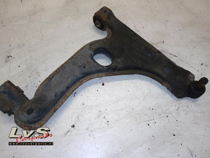 Opel Astra Front lower wishbone, left