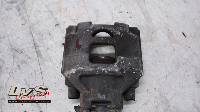 Toyota Yaris Front brake calliper, left