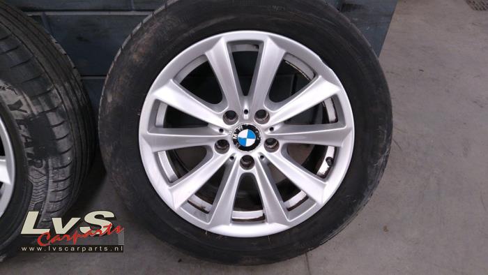 Velgen set + banden van een BMW 3 serie (F30) 316d 2.0 16V 2012