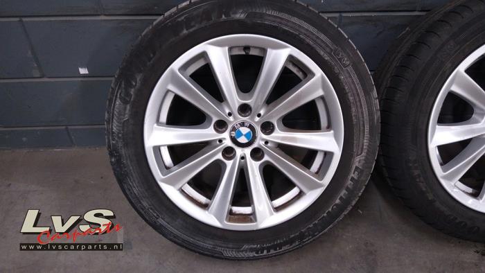 Velgen set + banden van een BMW 3 serie (F30) 316d 2.0 16V 2012
