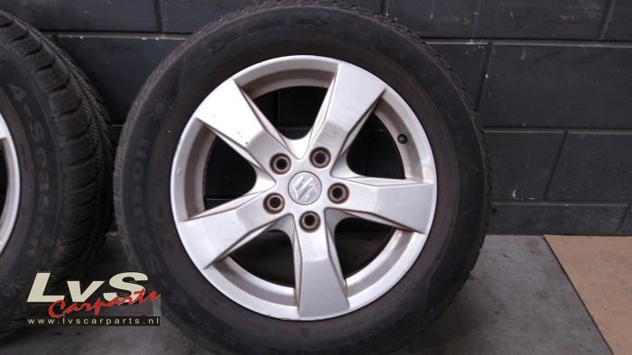 Suzuki SX-4 Velg + Band