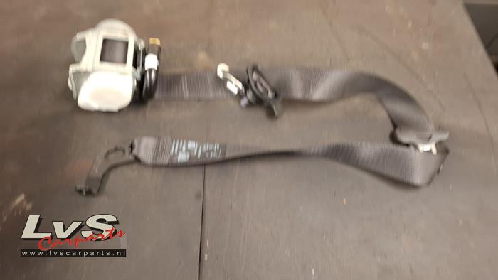 Opel Astra Seatbelt tensioner, right