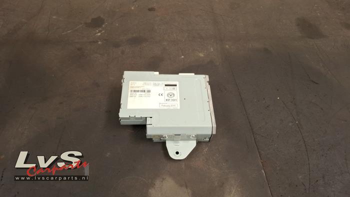 Mazda 2. Multi-media control unit