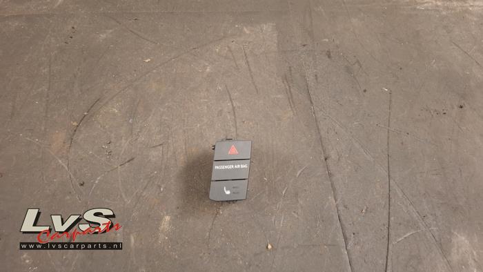 Volkswagen UP Seat heating switch