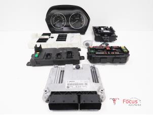 Gebruikte Contactslot + computer BMW 1 serie (F20) 116d 2.0 16V Prijs € 350,00 Margeregeling aangeboden door Focus Automotive