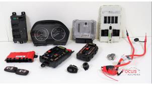 Gebruikte Contactslot + computer BMW 1 serie (F20) 116d 2.0 16V Prijs € 375,00 Margeregeling aangeboden door Focus Automotive