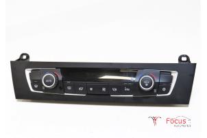 Gebruikte Chaufage Bedieningspaneel BMW 1 serie (F20) 116i 1.6 16V Prijs € 49,95 Margeregeling aangeboden door Focus Automotive